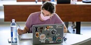students in classroom with masks