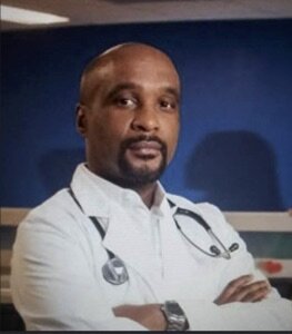 Dr. Travis Gayles